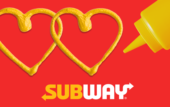 Red gift card with the subway logo and a mustard container drawing hearts in